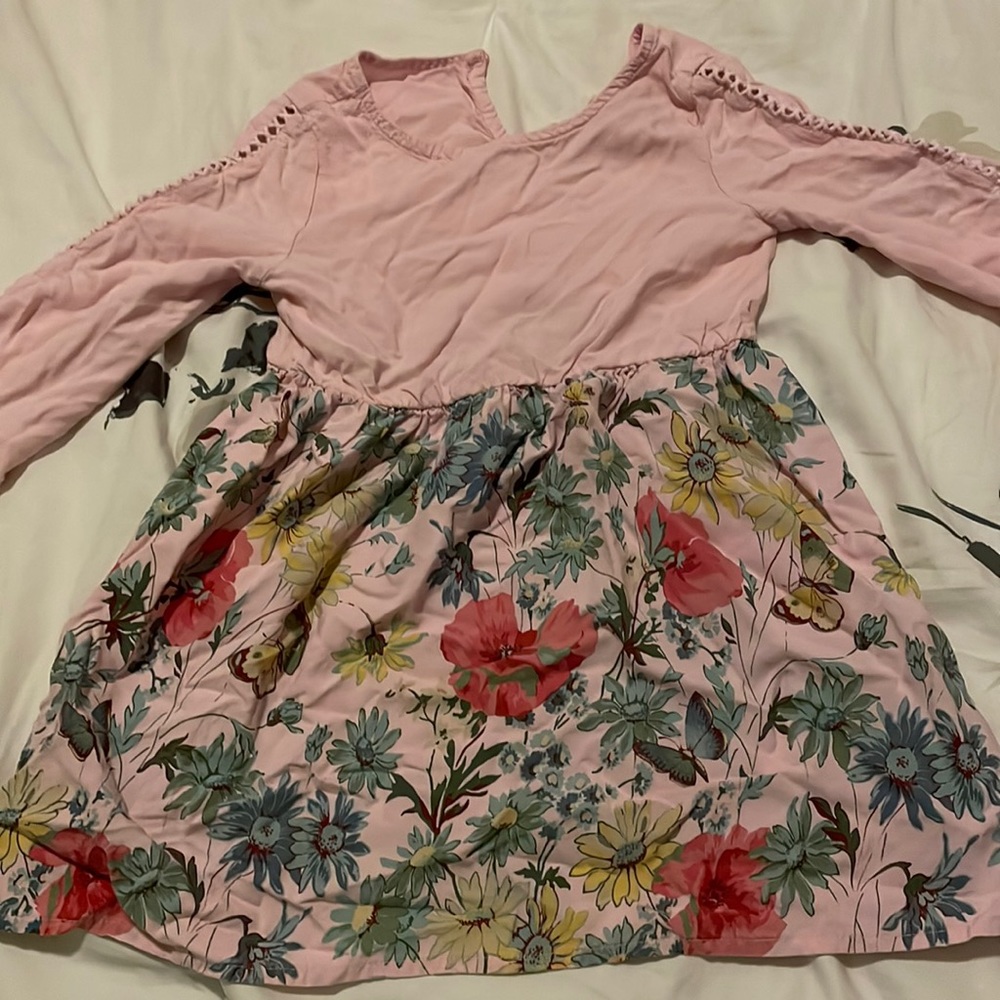 Beautiful flower and pink dress. Perfect for Spring and summer.